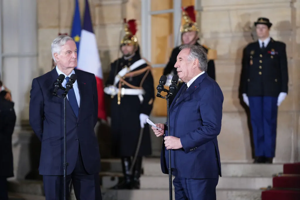 Michel Barnier, France's outgoing prime minister, left, during the handover ceremony with Francois Bayrou, France's incoming prime minister. on Dec. 13.