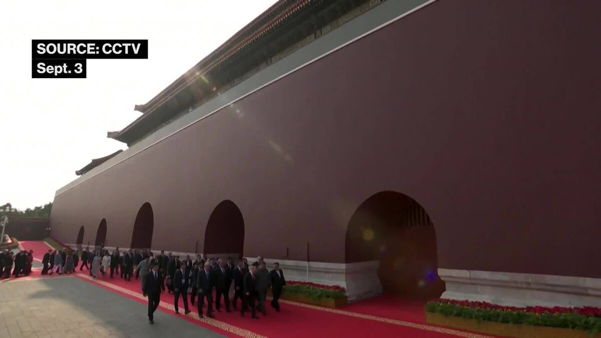 Xi and Putin Heard Discussing Longevity at Military Parade