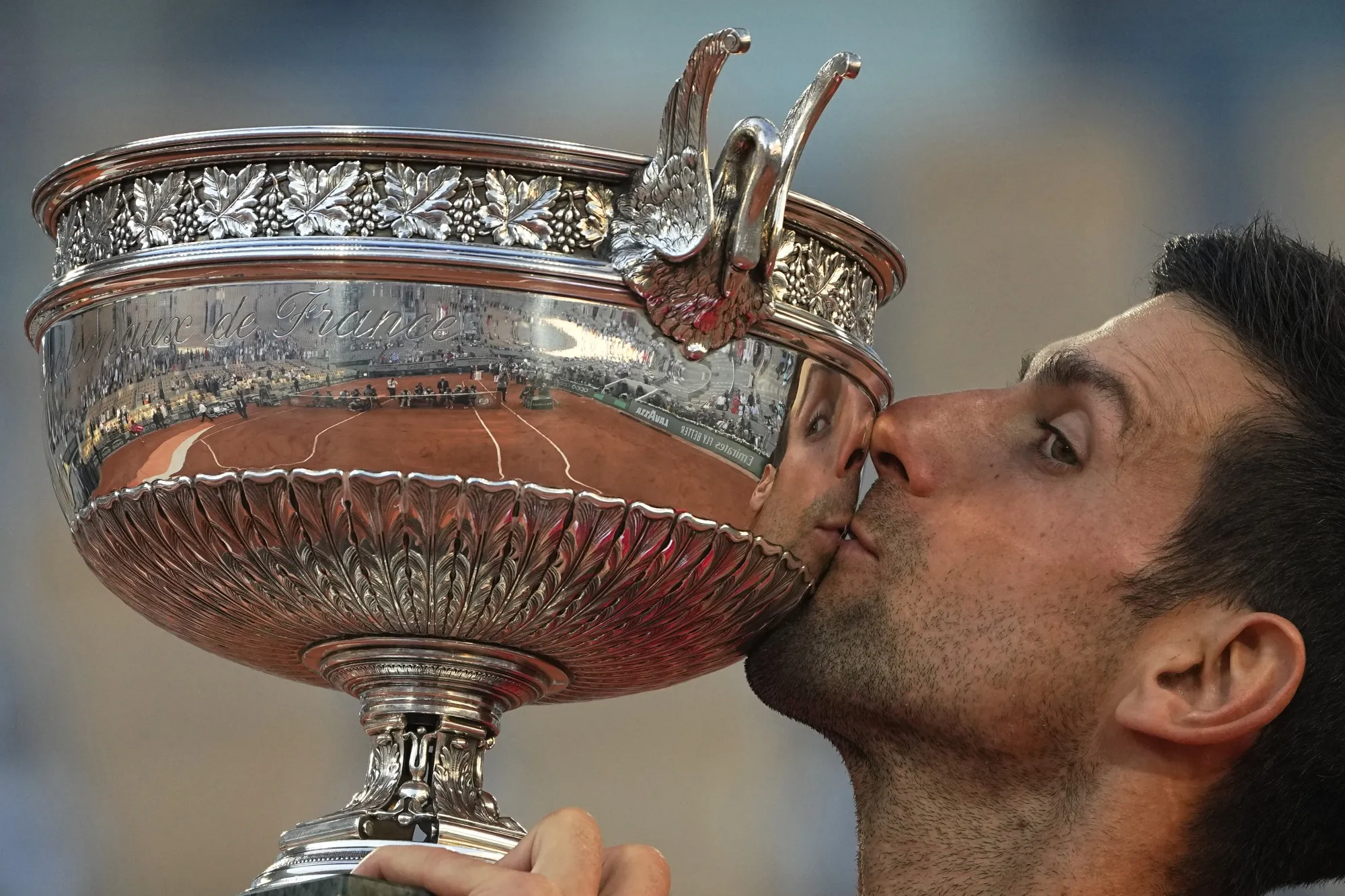Serbia's Novak Djokovic kisses the cup after defeating Stefanos Tsitsipas of Greece during their final match of the French Open tennis tournament at the Roland Garros stadium, Sunday, June 13, 2021 in Paris. Djokovic won 6-7 (6), 2-6, 6-3, 6-2, 6-4. Rafael Nadal and Novak Djokovic are both entered in the French Open, making it the first Grand Slam tournament with both of them in the field since last year’s French Open. (AP Photo/Michel Euler, File)