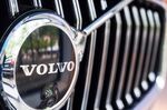 A Volvo badge and parking-assist camera on the grille of an automobile at a Volvo Cars,