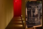 A sign notifies customers to keep a mask on while returning to tables at Crown Shy in downtown Manhattan. New York City will allow indoor dining at 25% capacity from&nbsp;Sept. 30.