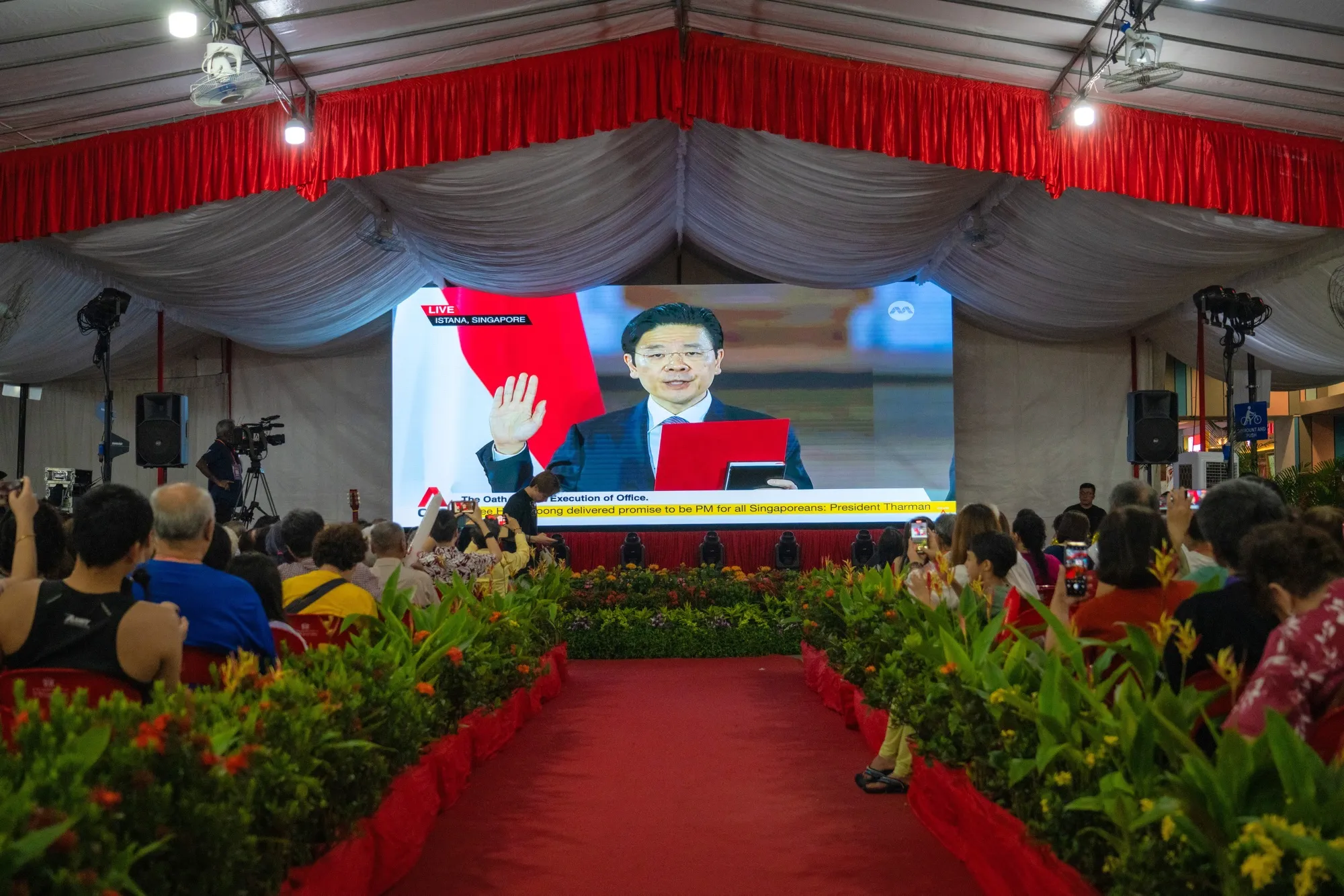 A&nbsp;broadcast of the swearing-in ceremony of Singapore&nbsp;Prime Minister Lawrence Wong in&nbsp;May 2024.&nbsp;