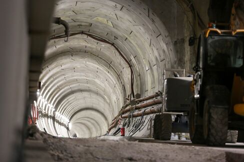 A tunnel leads away from the under-construction Canary Wharf Crossrail station.