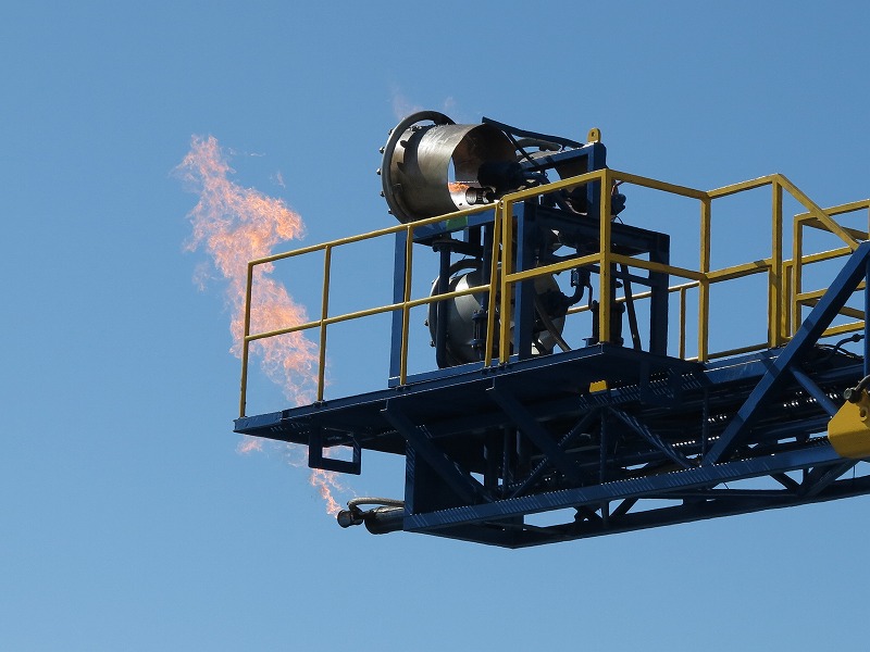 A flare burns as methane hydrate gas is produced from drilling in Japan.