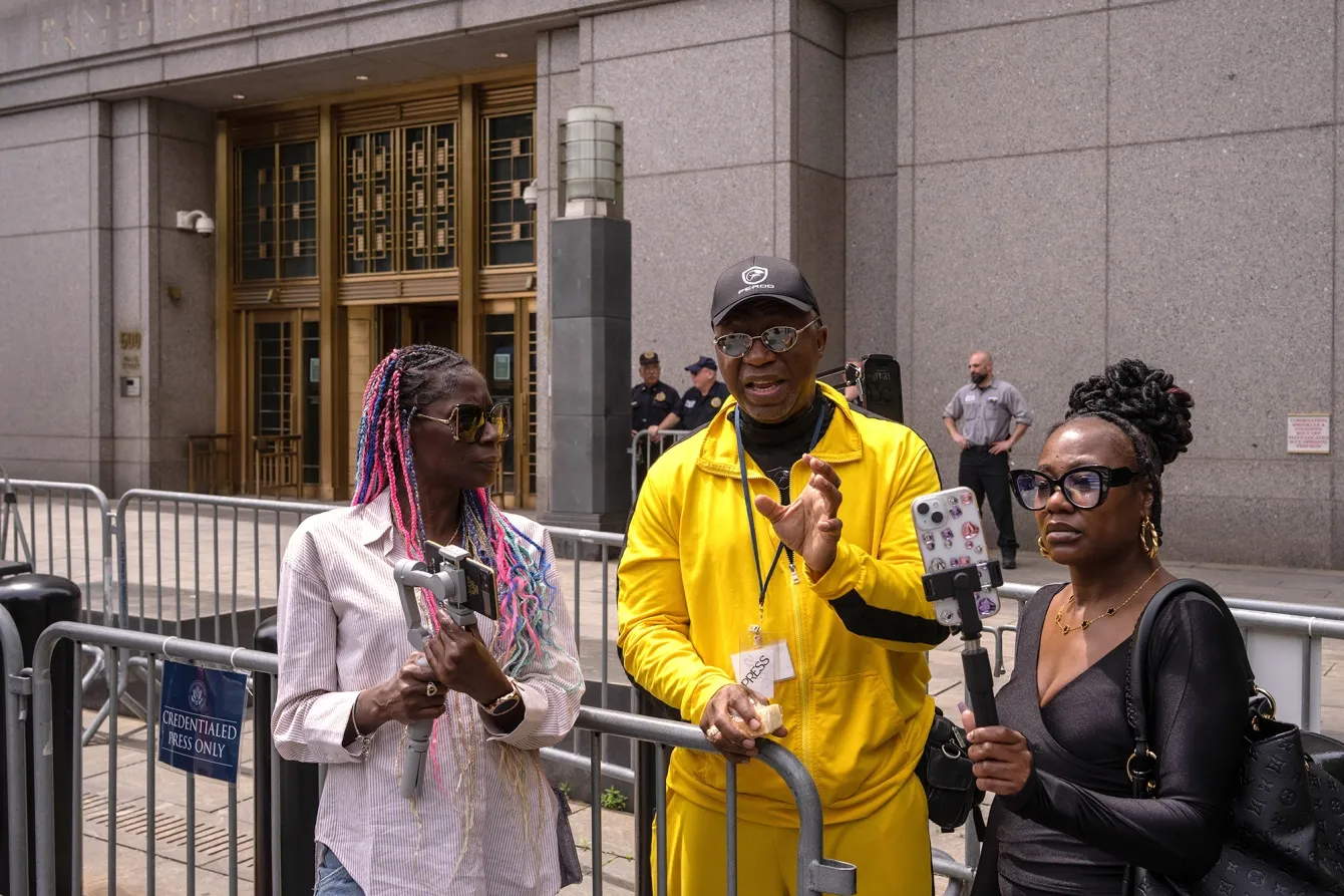 People film for social media&nbsp;outside of the Sean "Diddy" Combs sex trafficking trial at Manhattan Federal Court in New York, on&nbsp;May 27.