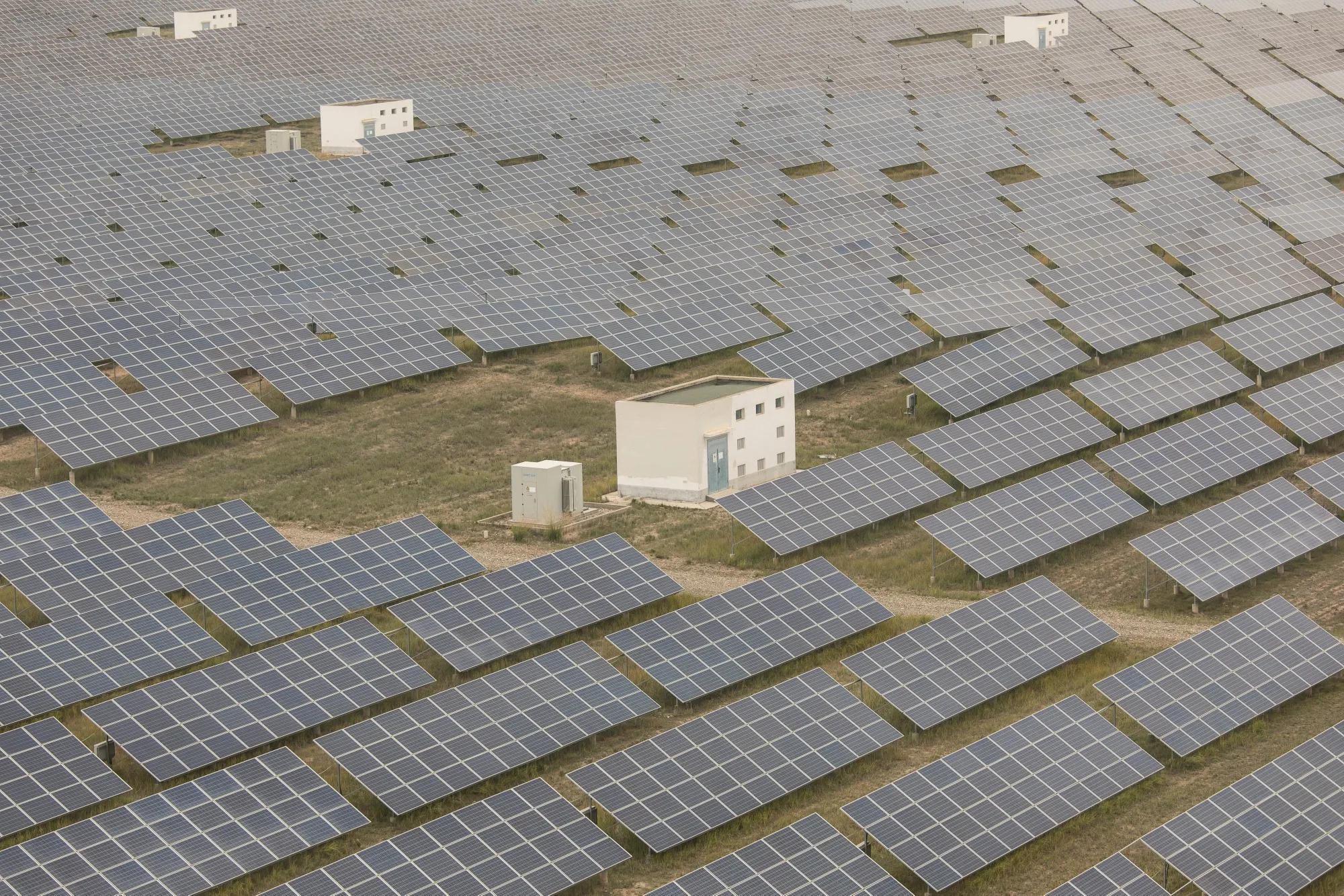 Photovoltaic panels at a solar farm operated by Yellow River Power in Gonghe County, Qinghai province, China.