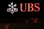 The UBS Group AG logo outside the company's headquarters in Zurich, Switzerland, on Tuesday, Jan. 26, 2021.