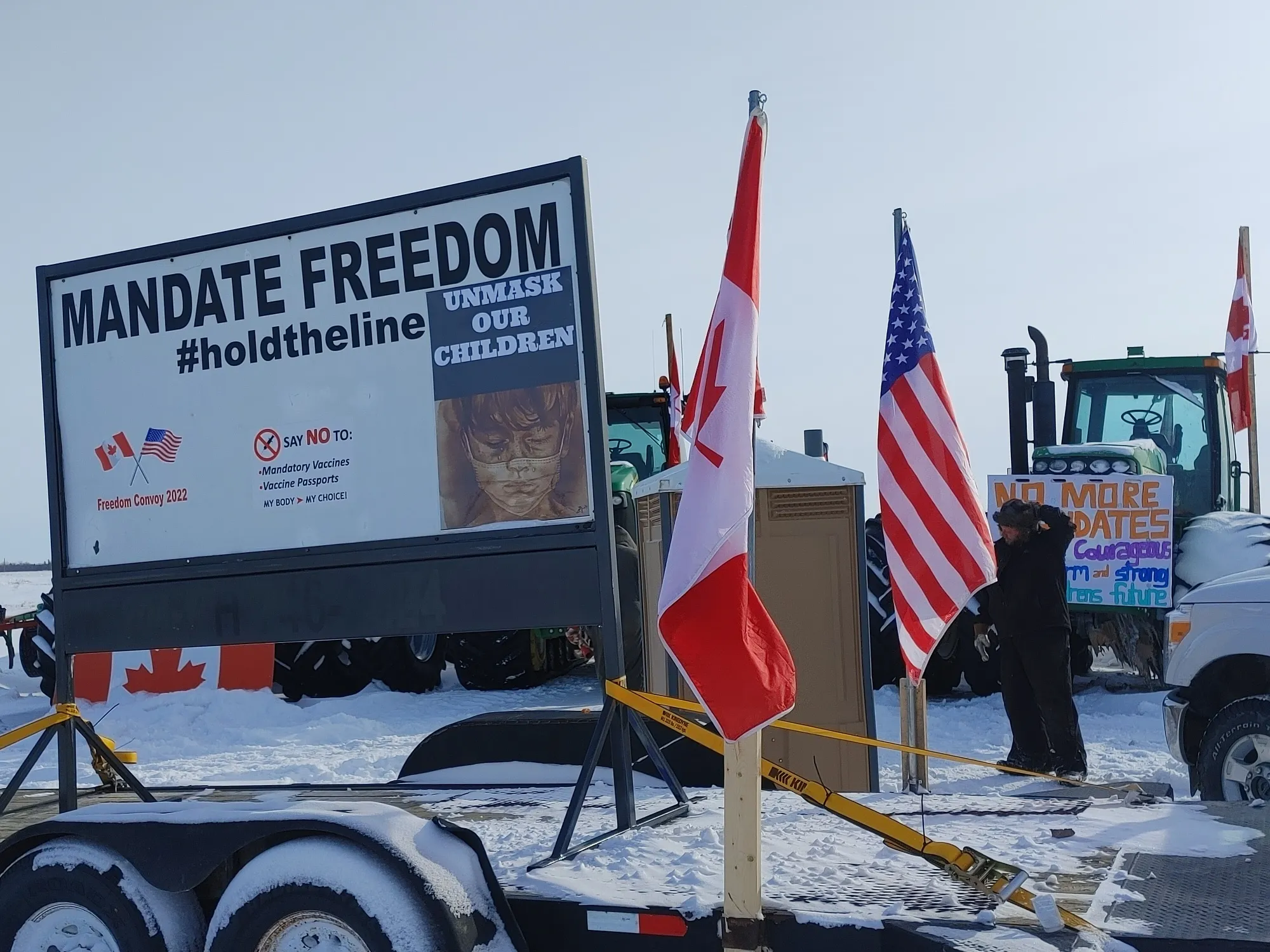 Vehicles block a border crossing in Emerson, Manitoba, on Feb. 14.