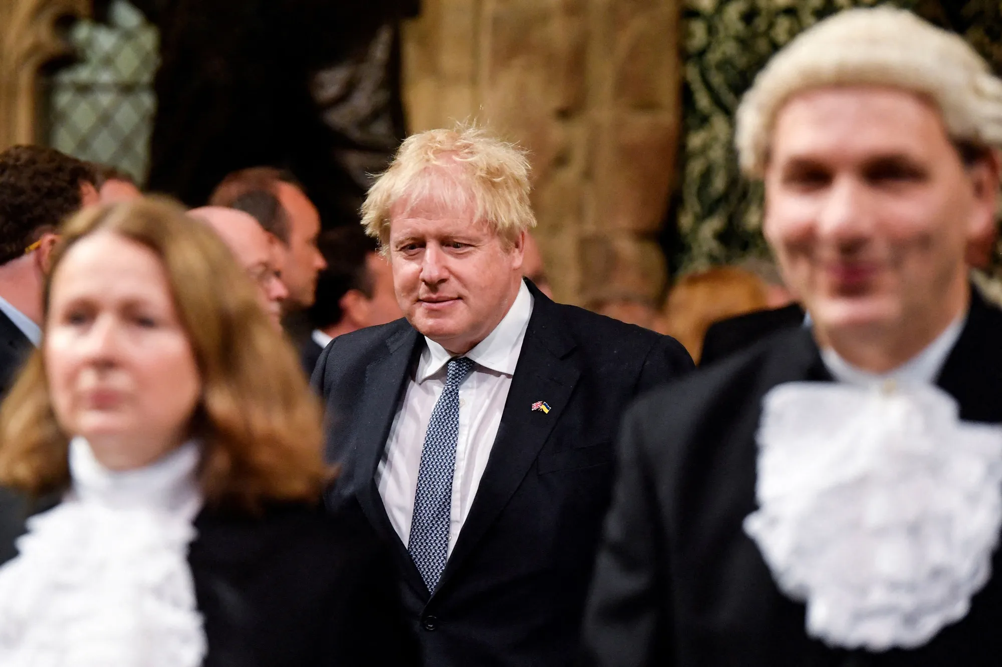 Boris Johnson processes through the House of Commons during the State Opening of Parliament, on May 10.