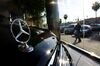 GLENDALE, CA - FEBRUARY 9: A pedestrian walks past a Mercedes-Benz dealership February 9, 2005 in Glendale, California. To pacify an animal rights group concerned about the thousands of cows that are slaughtered each year to make leather car seats and interiors, Mercedes-Benz has agreed to offer "leather-free" alternative versions of all its luxury cars. This comes after complaints from the German chapter of People for the Ethical Treatment of Animals which threatened protests. DaimlerChrysler plans to continue its leather versions on most of its Mercedes-Benz cars. (Photo by David McNew/Getty Images)