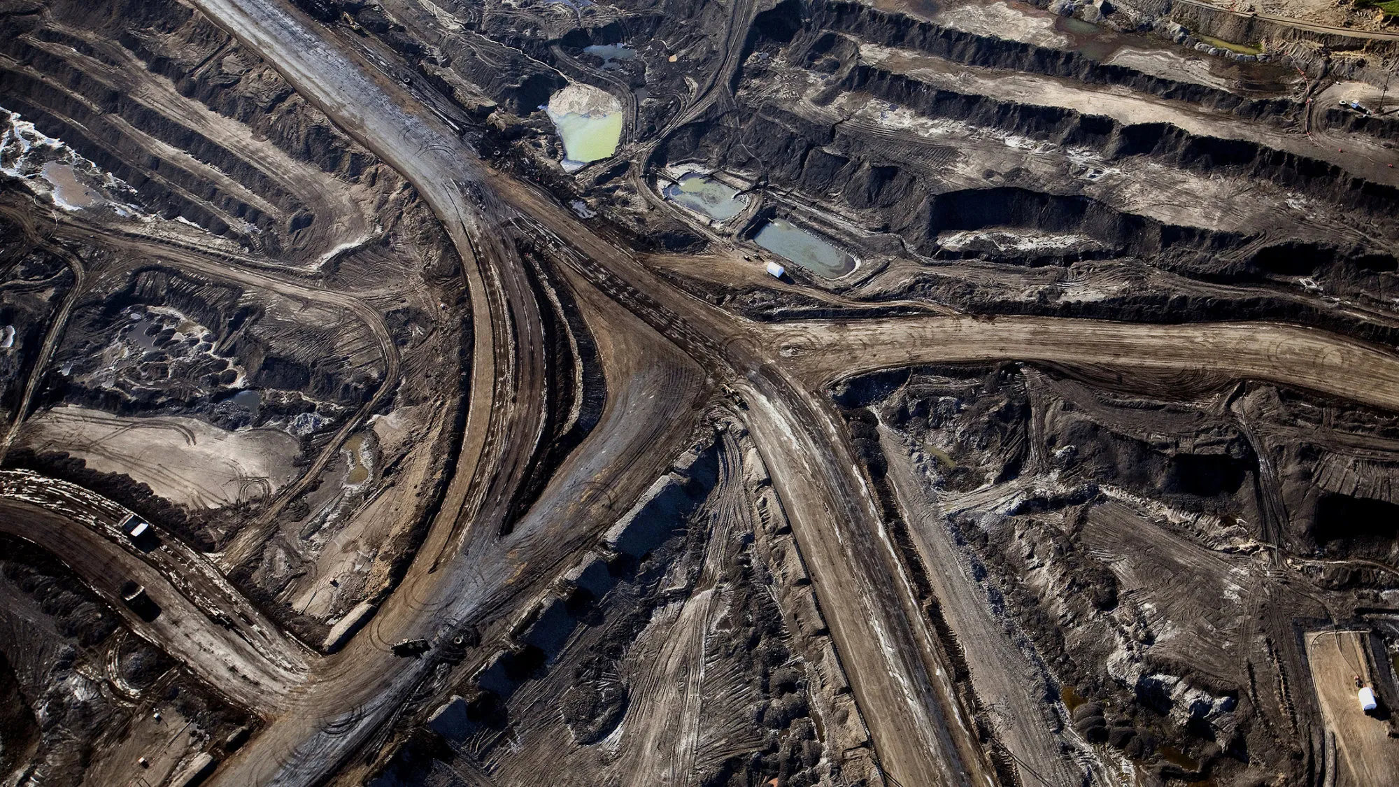 The Suncor Energy Inc. mine stands at the Athabasca oil sands in Alberta, Canada.
