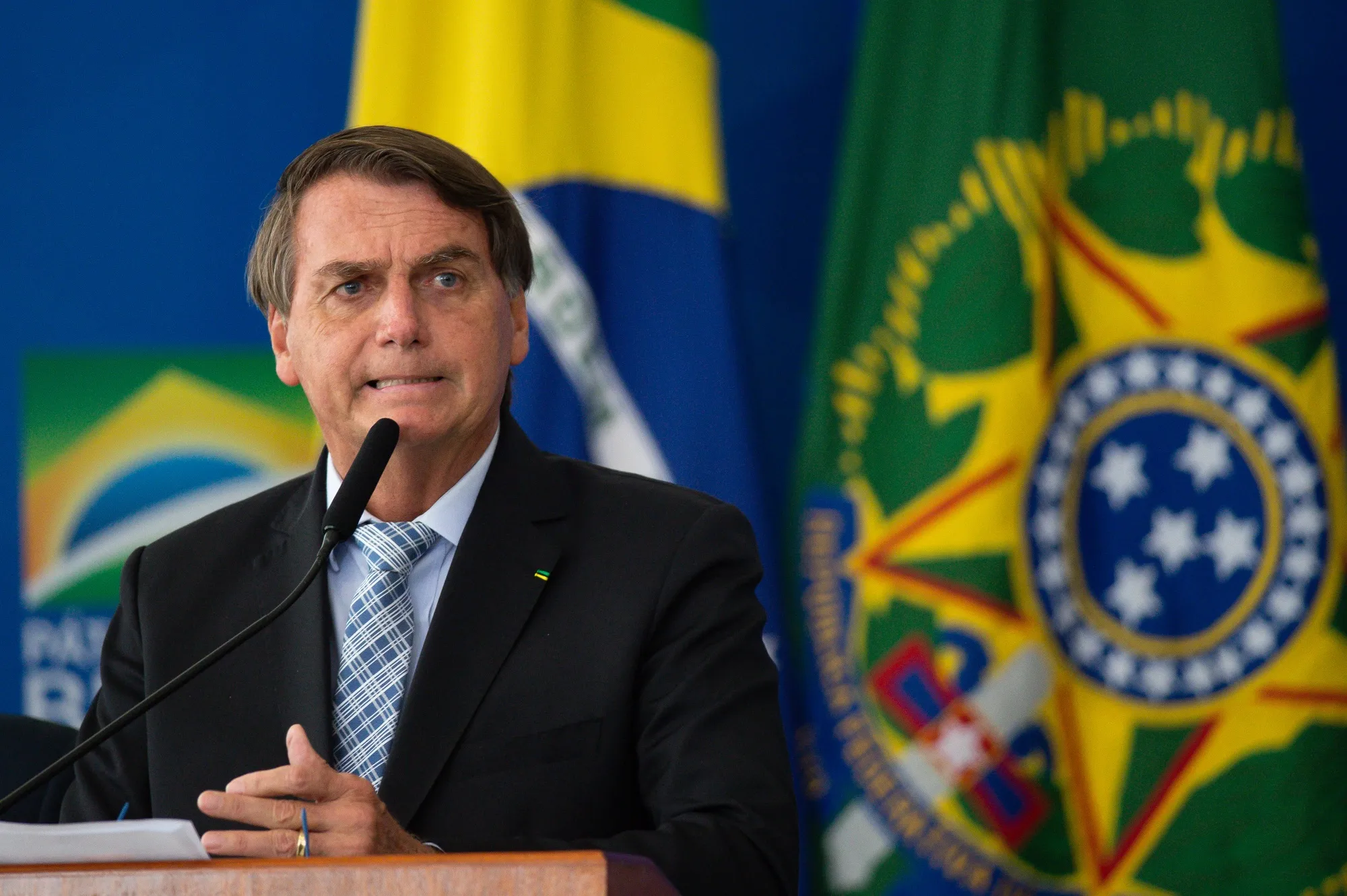 Jair Bolsonaro speaks during a bill signing ceremony at the Planalto Palace in Brasilia on March 10, 2021.