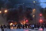 Smoke billows from burning tyres, pallets and fireworks during riots in Malmo, Sweden, on Aug.&nbsp;28.
