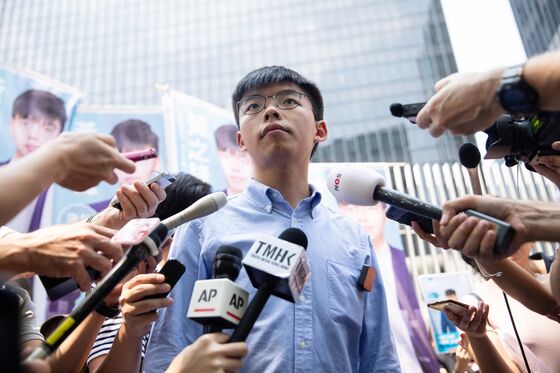 Riot Police Stand By as Demonstrators Gather: Hong Kong Update