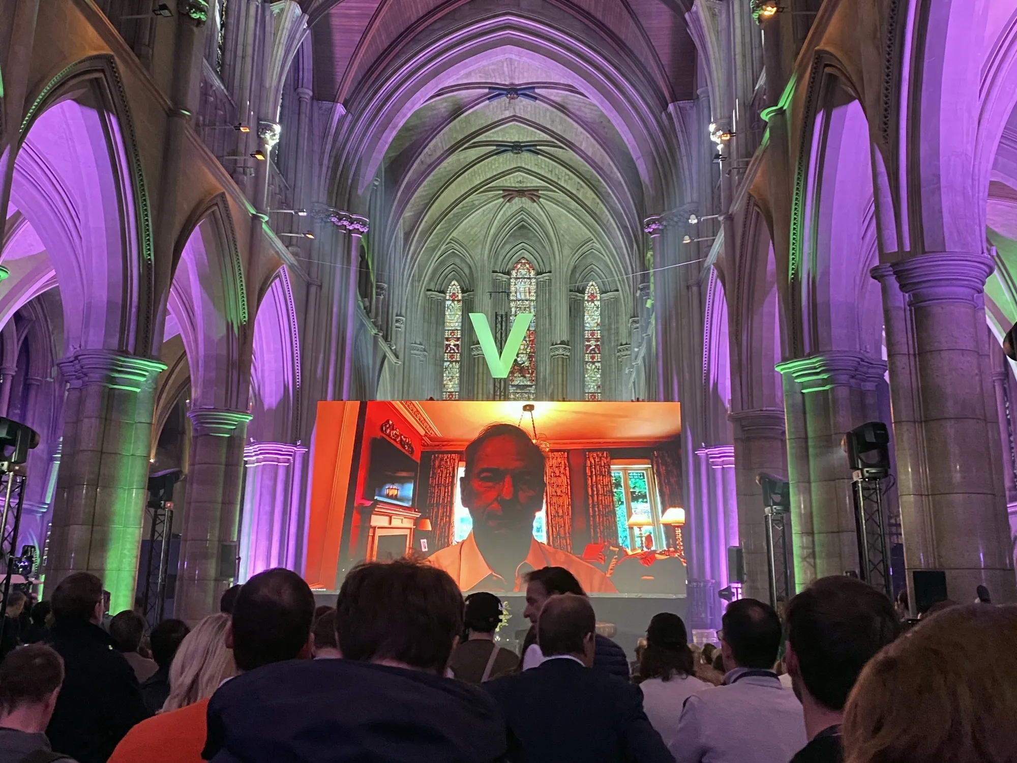 Former Google CEO Eric Schmidt speaks via video at "Visionaries Unplugged," an investor event in Paris, on Feb. 12.