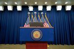 The seal of the Board of Governors of the Federal Reserve System on a podium in Washington. Photographer: Al Drago/Bloomberg