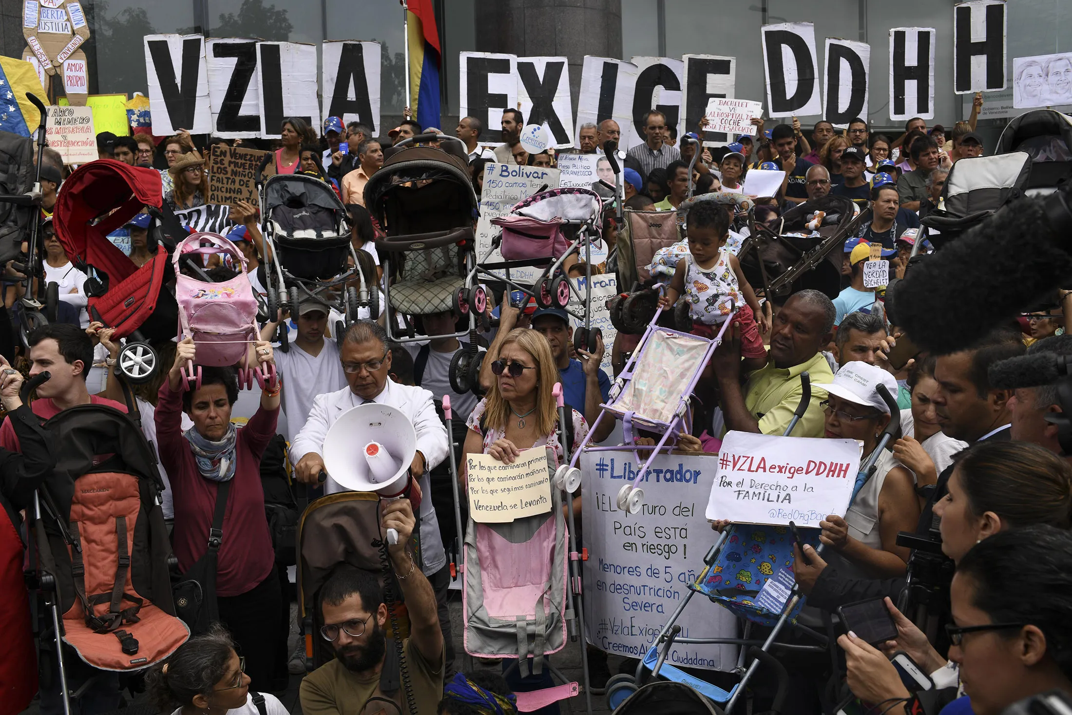 Protesters during a visit by UN High Commissioner Bachelet on June 21.