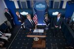 U.S. President Donald Trump arrives for a news conference in the James S. Brady Press Briefing Room at the White House in Washington D.C., U.S., on Sunday, Aug. 23, 2020.