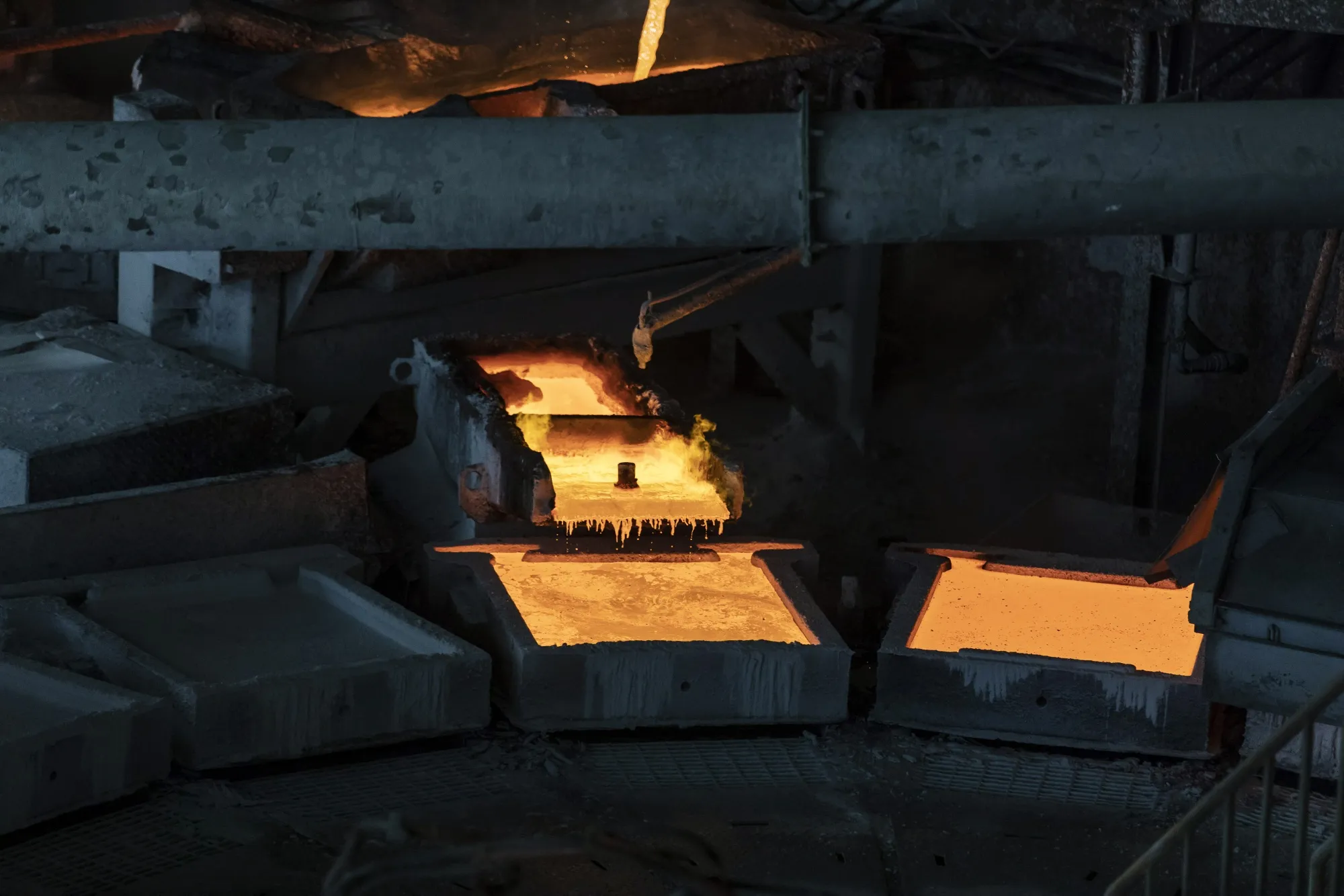 Molten copper flows into a casting vessel at a smelter in Tongling, Anhui province, China.