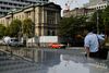 Pedestrians walk past the Bank of Japan (BOJ) headquarters in Tokyo, Japan, on Wednesday, Sept. 13, 2017. The BOJ\'s next monetary policy meeting is scheduled for Sept. 21. The central bank pushed back in July the projected timing for reaching its 2 percent inflation target for the sixth time as economic growth failed to drive price gains.
