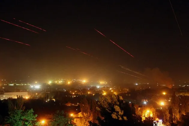 Tracer bullets from pro-Russian militants are fired at the National Guard of Ukraine, in the eastern Ukrainian city of Lugansk on June 3