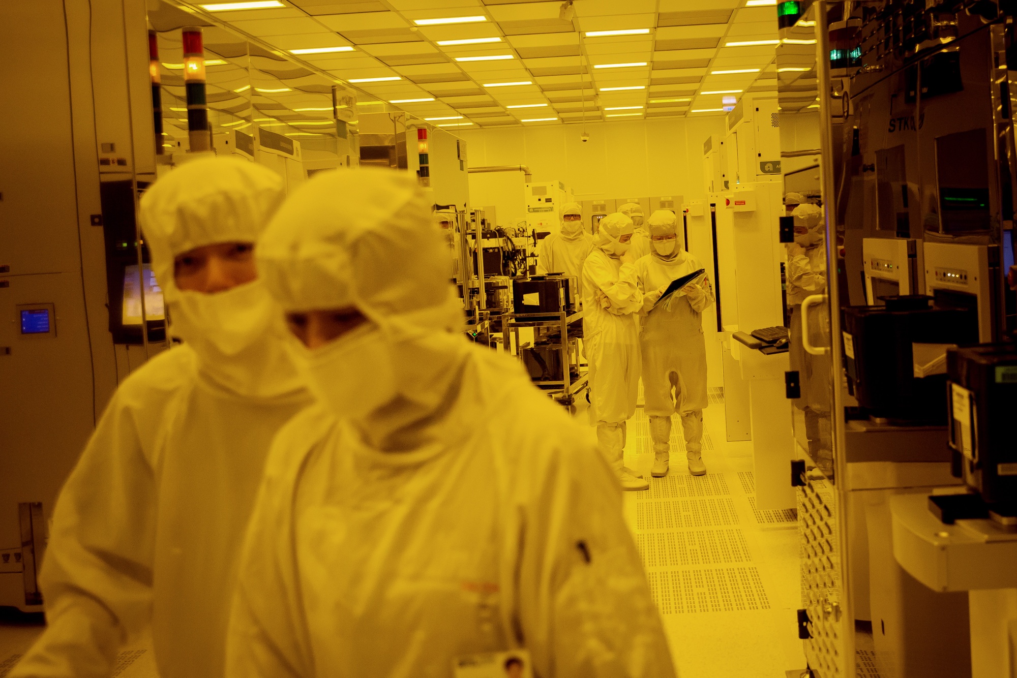 Employees work inside a chip plant.