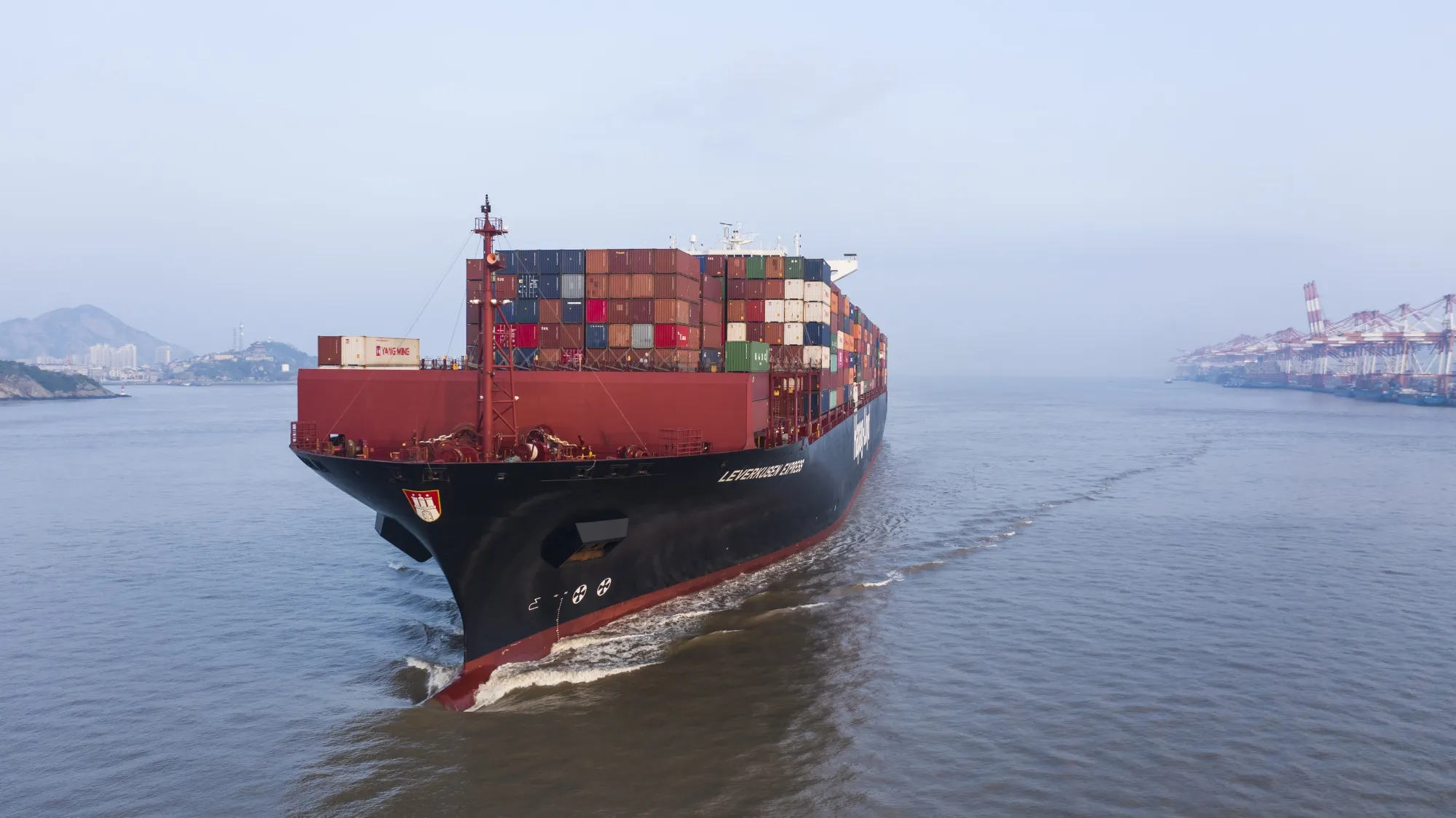 A Hapag-Lloyd AG container ship sails out of the Yangshan Deepwater Port in Shanghai.&nbsp;