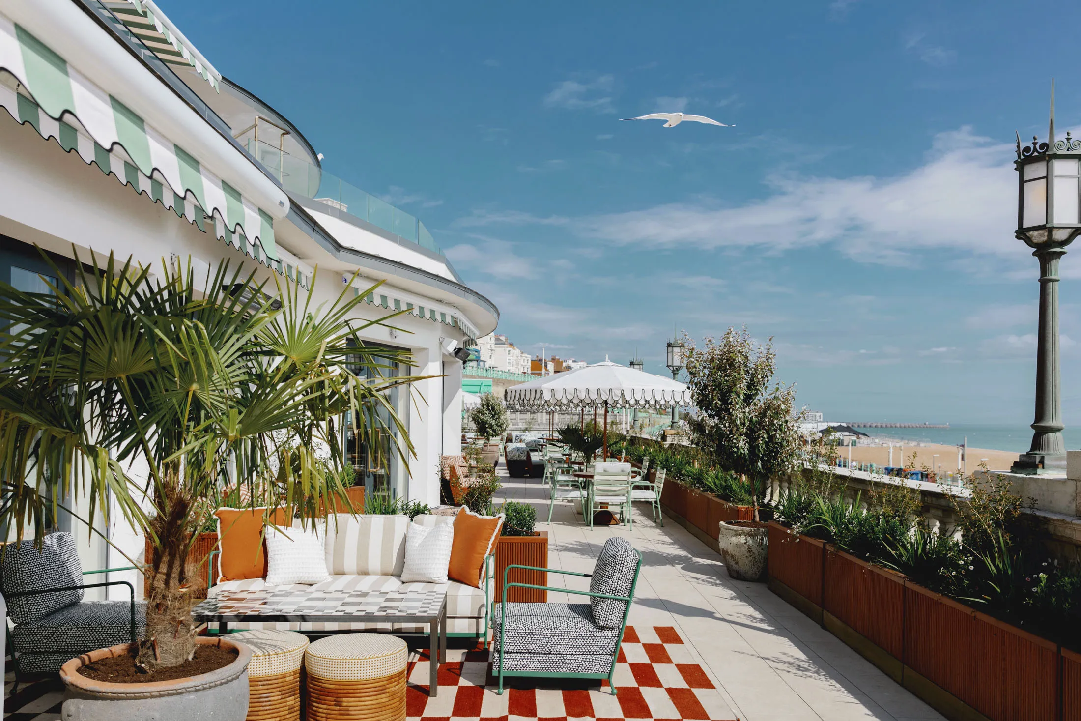 The Club Cecconi&nbsp;terrace overlooks the beach.