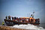 Migrants, picked up at sea attempting to cross the English Channel, at Dungeness, UK, on June 15.