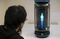 Minori Takechi, chief executive officer of Vinclu Inc., interacts with Azuma Hikari, the first character for the Gatebox virtual home robot during a demonstration at the company's office in Tokyo, Japan, on Tuesday, March 4, 2017. Photographer: Tomohiro Ohsumi/Bloomberg