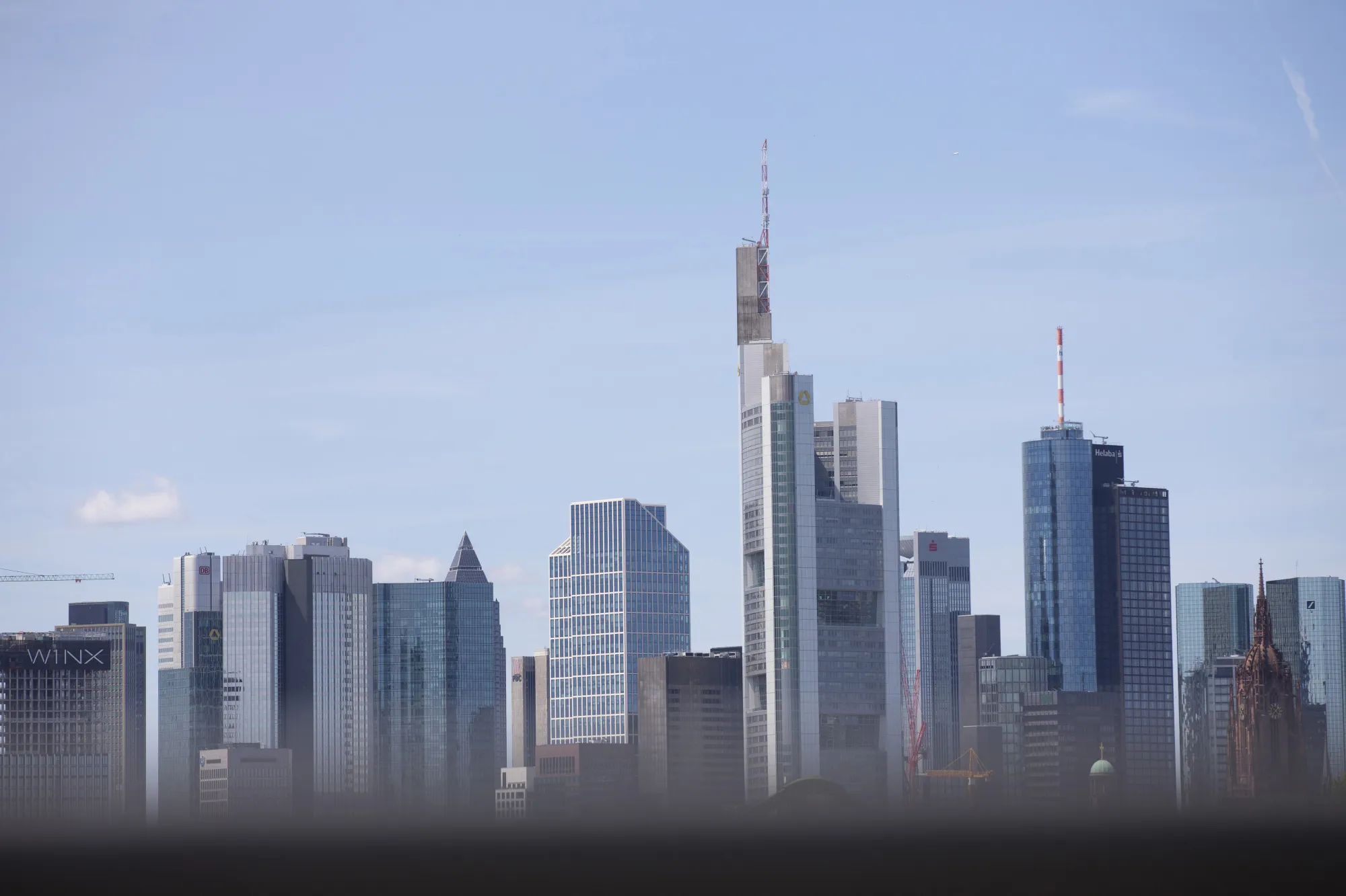 Skyscrapers stand on the city skyline in Frankfurt, Germany, on Monday, June 12, 2017. The European Union is pushing ahead with plans to assert control over the clearing of euro-denominated derivatives, a politically charged step that could force firms to move from London to the EU after Brexit.