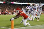 Mecole Hardman of the Kansas City Chiefs dives to score a 25 yard touchdown against the Buffalo Bills during the third quarter in the AFC Divisional Playoff game at Arrowhead Stadium on Jan. 23.