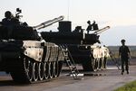 Servicemen prepare for a live demonstration of Russian battle tanks at the International Military-Technical Forum 'ARMY 2018' expo at Kubinka airfield in Kubinka, Russia, on Tuesday, Aug. 21, 2018.