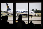 A Ryanair passenger aircraft taxis towards a gate at Budapest Ferenc Liszt International Airport.