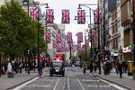 Buses and taxis pass along Oxford Street, London's busiest shopping destination, in London, UK, on Wednesday, April 23, 2025. UK government borrowing exceeded official forecasts made just last month, highlighting the fragile state of the public finances even before US tariffs dimmed the economic outlook.