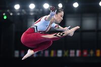 Kim Bui from Germany in action during women's gymnastics preliminary balance beam qualification on July 25. 