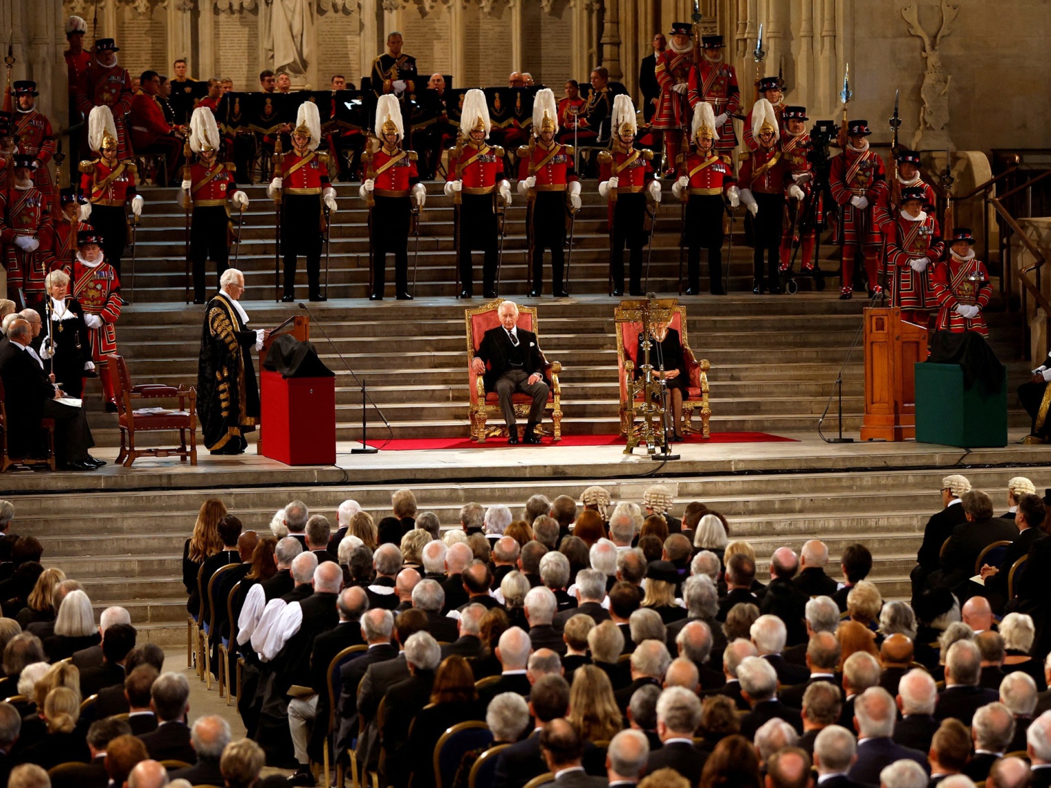 King Charles III, center, and Camilla, Queen Consort at Westminster Hall in London, on Sept. 12.