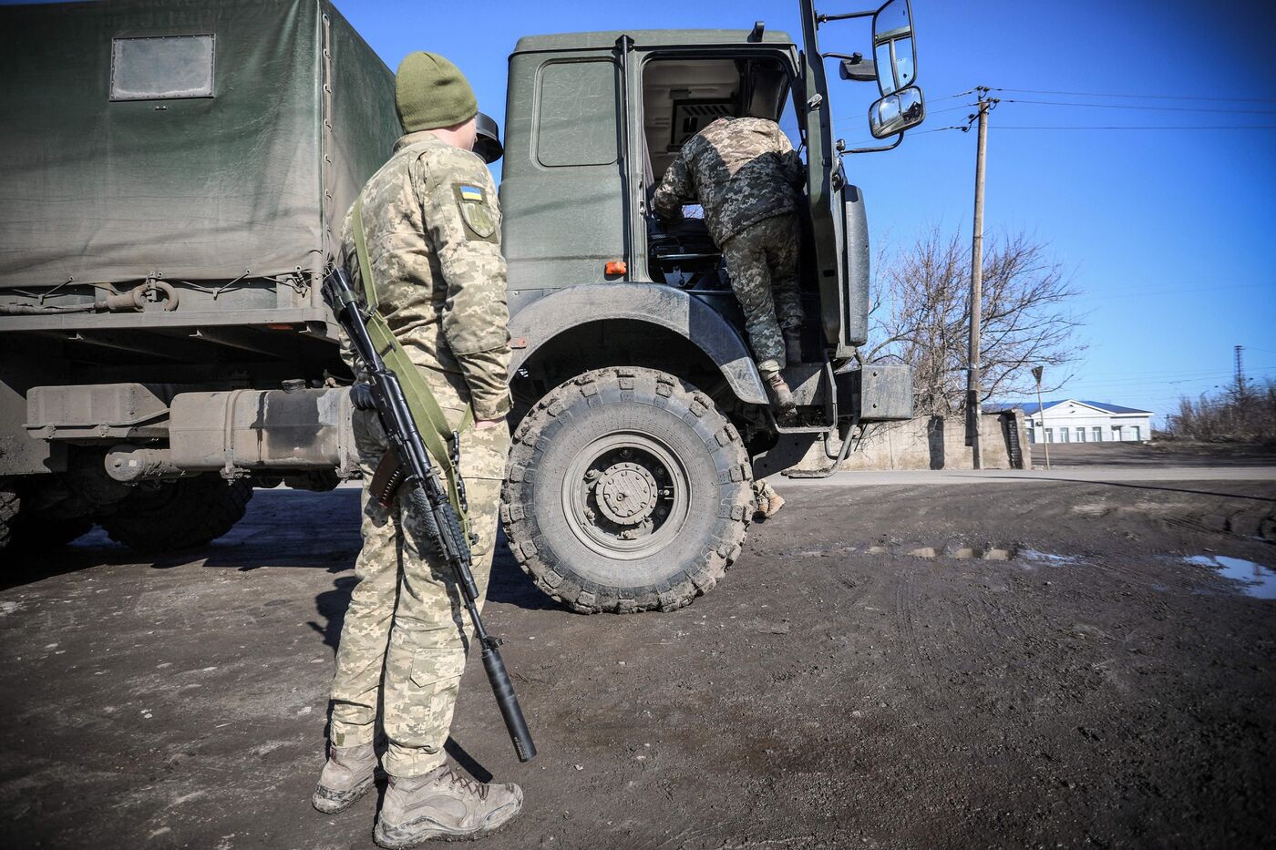 A Ukrainian Military Forces serviceman stands by a military vehicle in Avdiivka, Donetsk region, in Ukraine, on Feb.&nbsp;21.