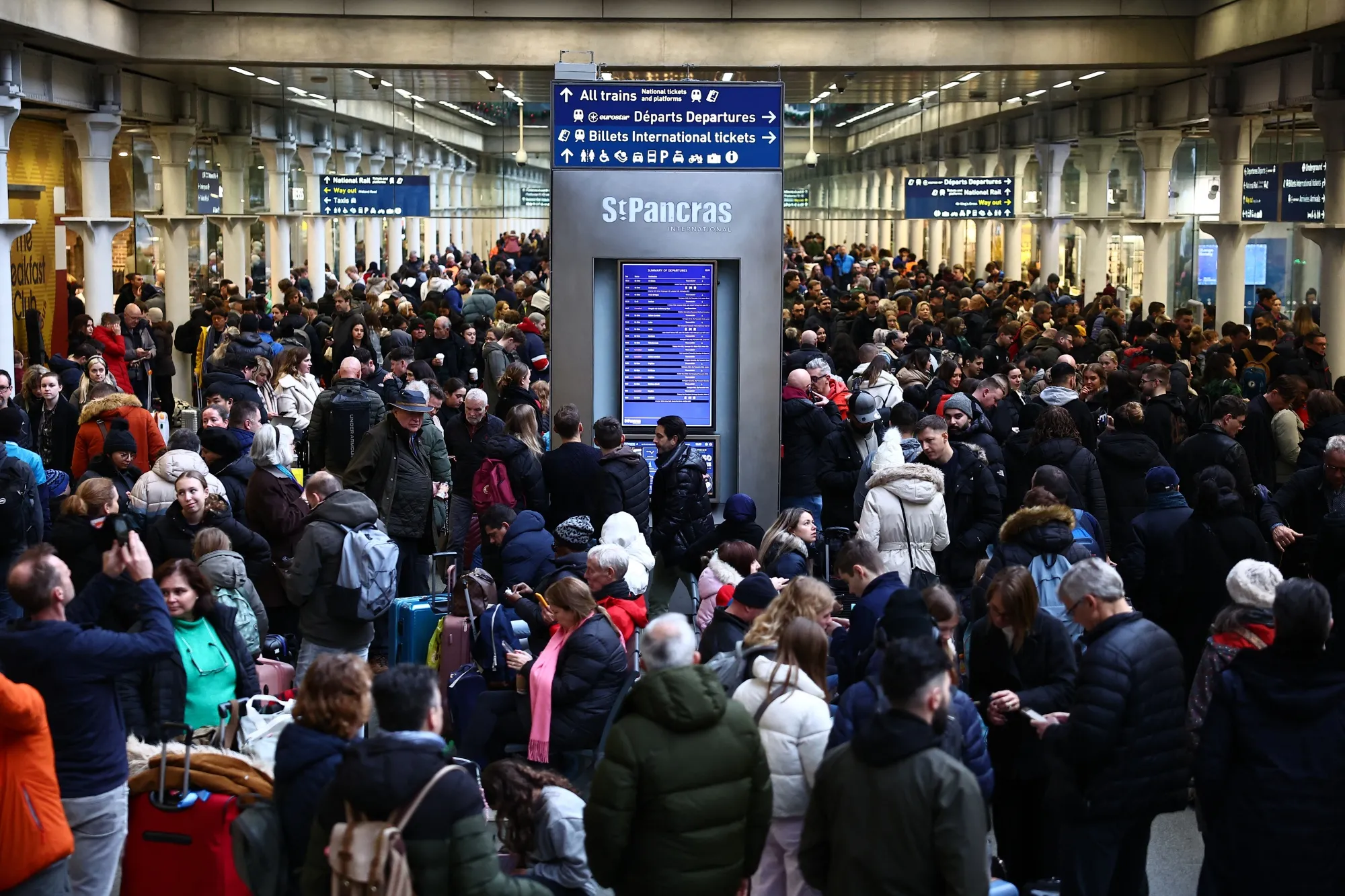 Passengers wait for news of Eurostar departures at St Pancras station in London, on Dec.&nbsp;30.