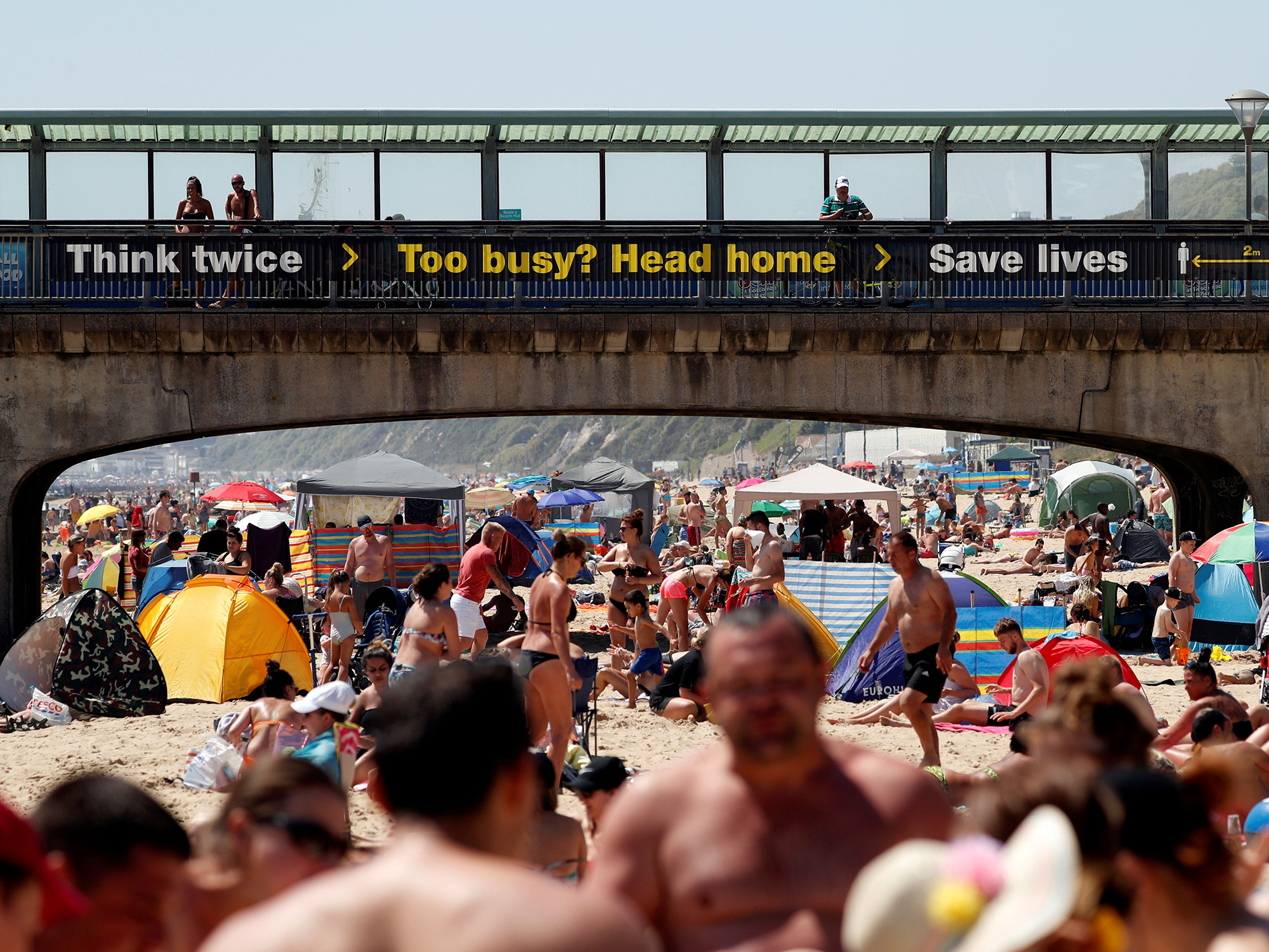 Beachgoers gather on Boscombe beach in Bournemouth, U.K., on May 30.