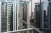 Residential buildings are reflected in windows at Gramercy Park, a freehold residential project developed by City Developments Ltd., in Singapore, on Thursday, May 19, 2016. City Developments, Singapore's second-largest developer, may seek to buy offices this year as rising interest rates makes such assets cheaper worldwide.