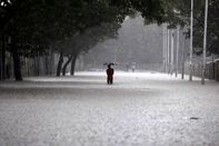 TOPSHOT-INDIA-WEATHER-RAIN
