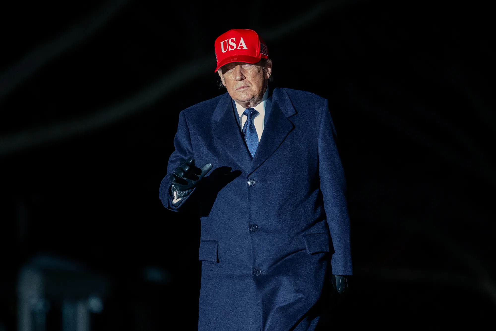 President Trump walks toward the White House after arriving on Marine One on March 1.