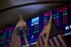 Monitors display stock market information on the floor of the New York Stock Exchange (NYSE)