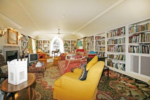 Yes, there’s more modern, modest rooms in the castle, too—like this living room/library.