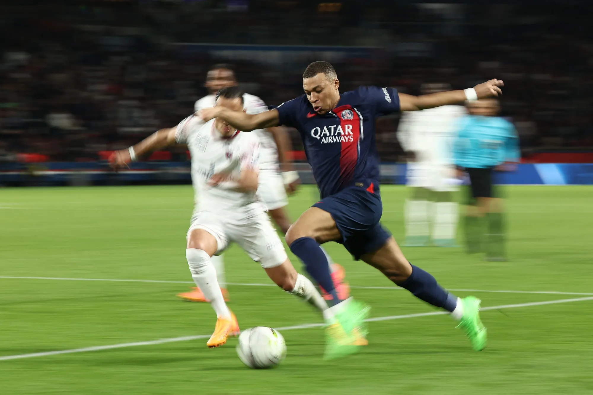 PSG’s Kylian Mbappe runs with the ball during a French Ligue 1 match in April.