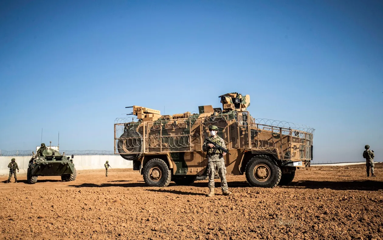 A Turkish soldier stands guard during a joint Russian-Turkish patrol in the town of Darbasiyah near the border with Turkey in Syria's northeastern Hasakah province in 2020.&nbsp;