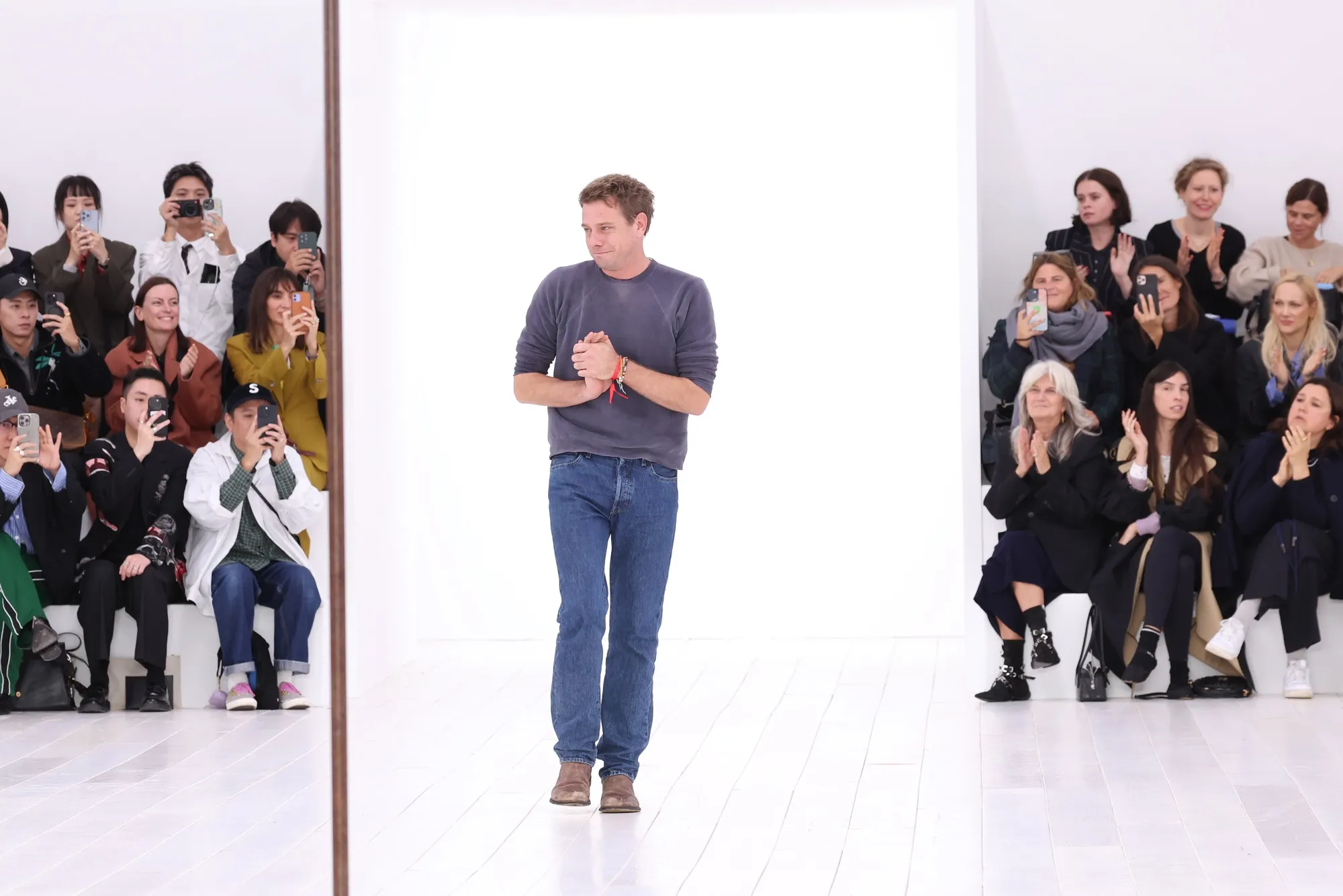 Designer Jonathan Anderson walks the runway during Paris Fashion Week in Paris, on Sept. 27.&nbsp;