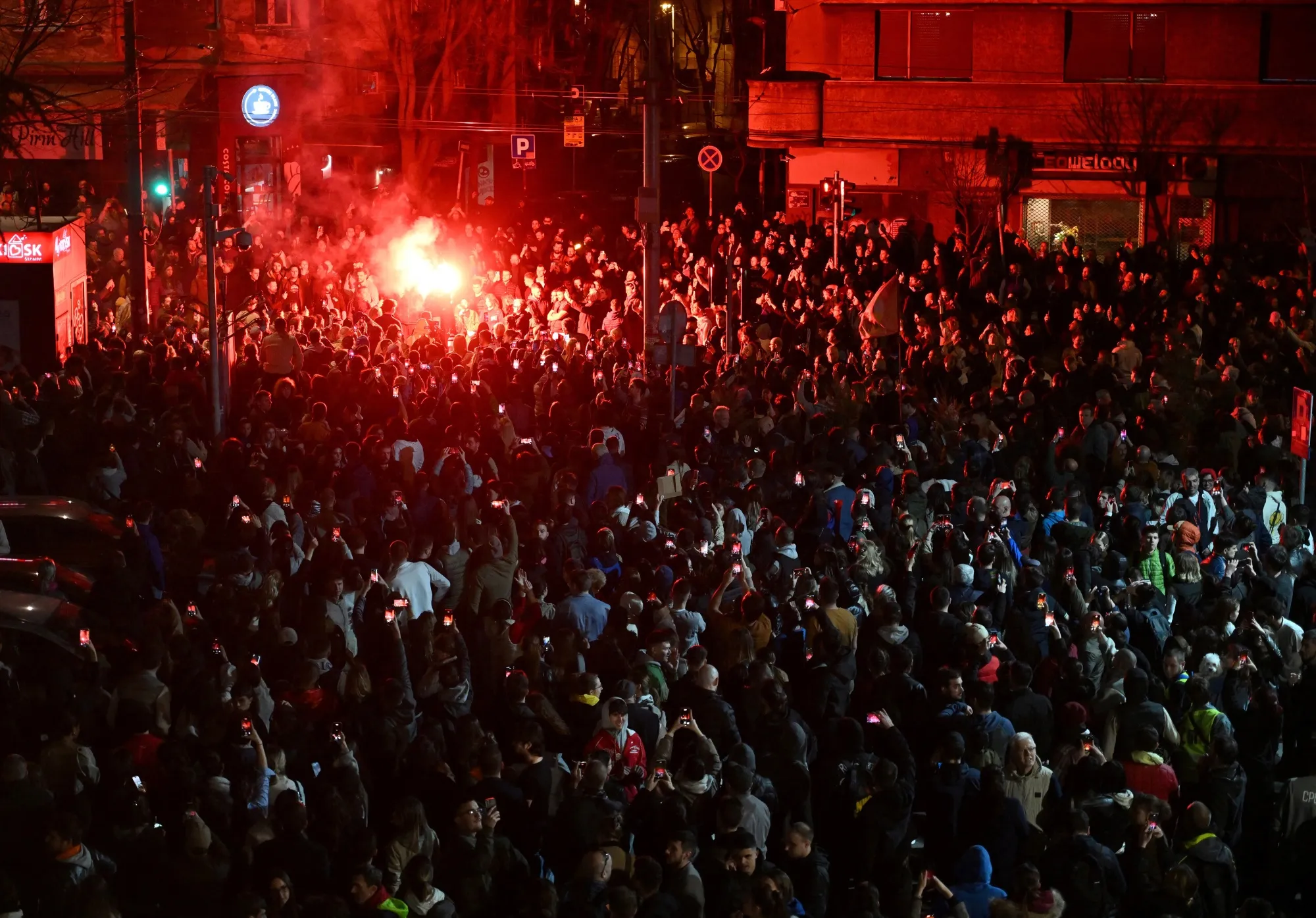 Protesters block entrances of Serbian public broadcaster RTS in Belgrade on March 11.