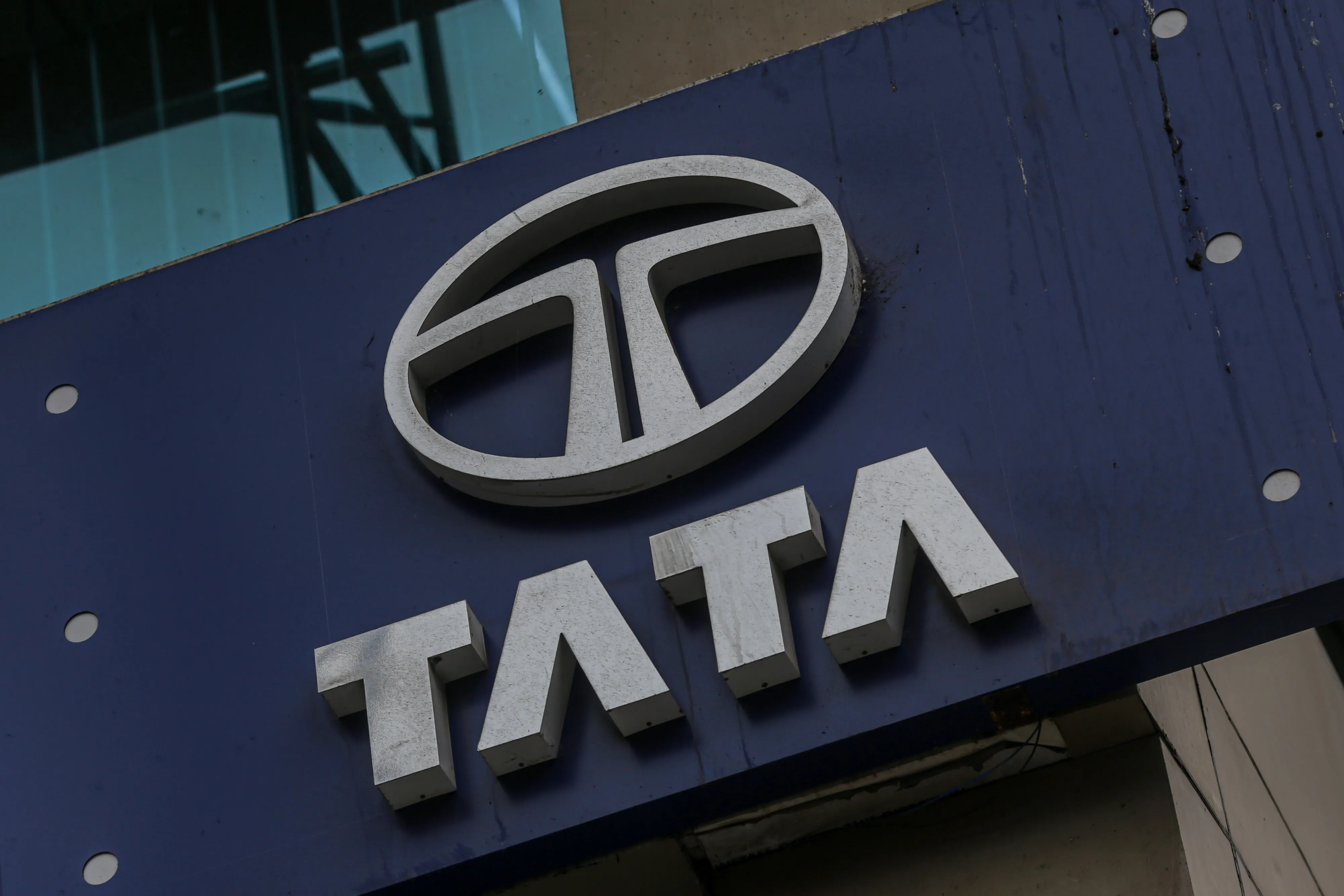 Tata Group's logo at a dealership.